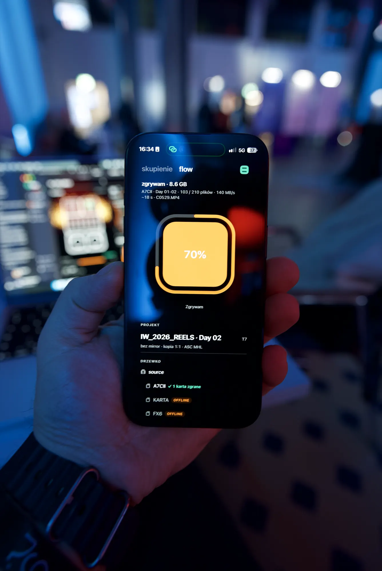 iPhone close-up: ingesting 8.6 GB from the A7C II, 70%, project IW_2026_REELS Day 02
