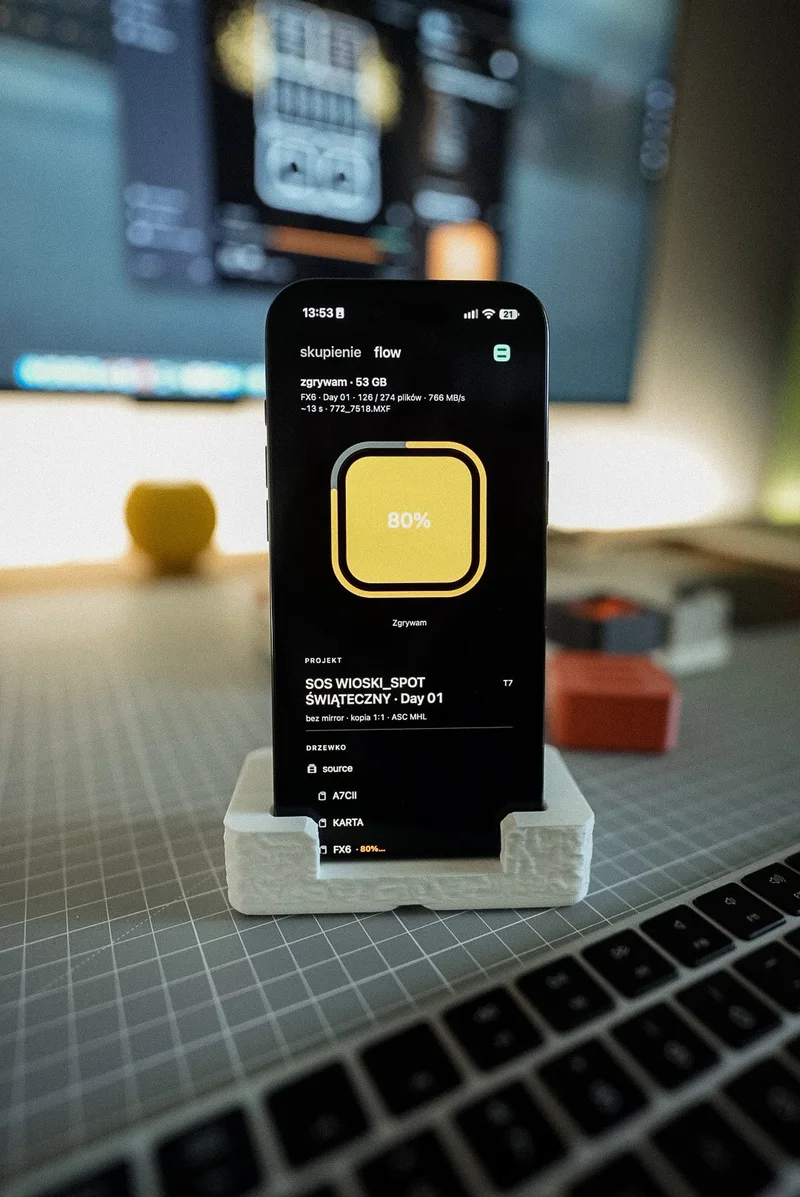 iPhone in a stand up close, ingest at 80%