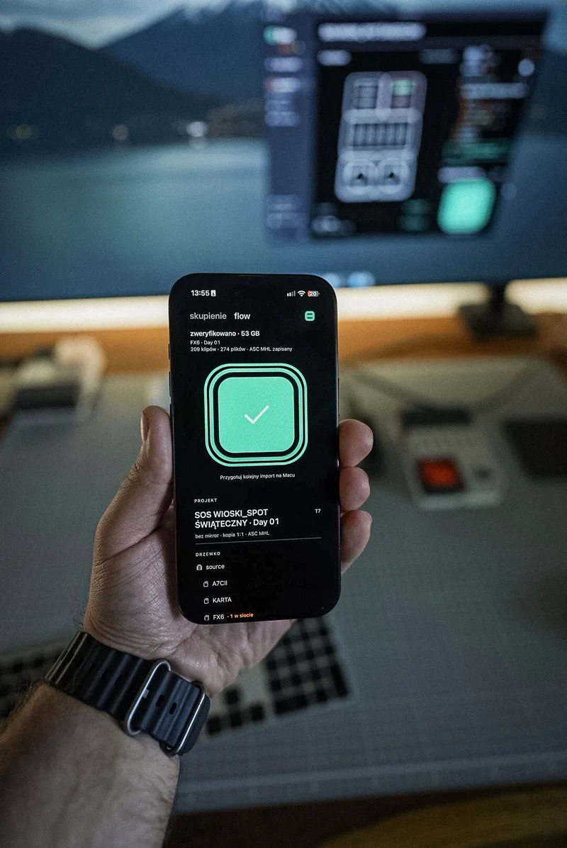 iPhone in hand with the "verified" screen